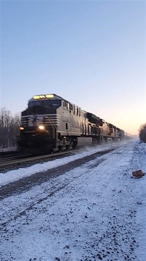 Early morning CSX oil train with Norfolk southern and Union Pacific power kicks up snow! 121326