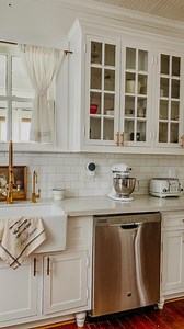 16K views · 7.5K reactions | No wonder why I always loved the look of glass kitchen cabinets!! Looking back at all the amazing movies from the 90s they all had them! Such a timeless and cozy look  Movies featured here -Practical magic -Somethings gotta give -Father of the bride -You’ve got mail #glasscabinet #kitchencabinets #cabinets #builtin #builtincabinets #kitchendesign #kitchenremodel #kitcheninspo #timelesskitchen #timelessdesign | Rosie's Corner | Facebook