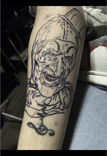 Now this is a work of “Art” a terrifier tattoo of “Art The Clown” it looks super sick!