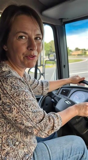 AI Driving Truck: Emily Carter, an American Driver, Demonstrates Smooth Pedal Control Wearing Clogs