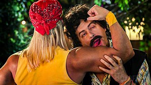 This guy is REALLY into big arms and Hulk Hogan looking chicks. | Boxoffice Movie Scenes