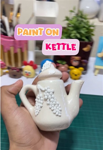 Fruit-Themed Painting on a Kettle and Tea Set