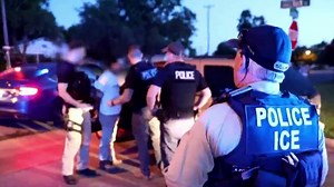 American teens were handcuffed after federal agents arrested their father