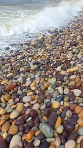 This stone is indeed “Indigo Gabbro”, also known as “Mystic Merlinite”. Indigo Gabbro is a rock composed of various minerals, including Feldspar, Chlorite, Muscovite, Pyroxene, Hercynite, Magnetite, and potentially Olivine, Chrome Garnet, and Biotite. It can therefore look slightly different depending on which minerals it includes and the processes each stone goes through. | Omar Nacer