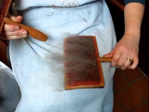 using hand carders with wool