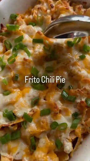 Frito Chili Pie Calling all of our chili lovers! Seriously what pairs better with tailgating season than a hearty bowl of chili and corn chips??! We’re coupling this classic combo into one delicious casserole that’s perfect for bringing to your next tailgate or just enjoying at home. It’s simple to make and it feeds a crowd so it’s a win win!! Stay tuned for our salad recipe that can be served alongside of this casserole. • 1 lb ground beef 1/2 small onion chopped Salt and pepper 1 c chili sauce