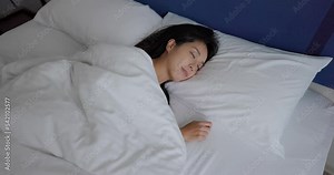 Woman sleep on bed at room