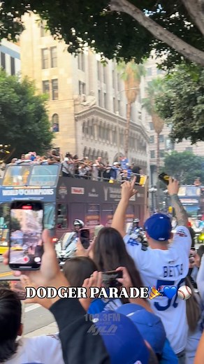 #PressPlay We’re live at the Dodger Parade! 💙⚾️ Back-to-back champions and the city is going crazy! 🔥 Let’s go Dodgers!! 🎉 • Who do you spot? 👀 Drop their names in the comments! ⬇️ #RadioFreeKJLH #WeAreYou | 102.3 RadioFree KJLH