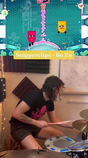Drumming along to some of Bo En’s good goopy tunes from Snipperclips [Silly Science A] [video description: josie drumming in a small practice space with overlaid gameplay from Snipperclips - featuring two small colored shapes solving a puzzle in a stream of pink goop] #drums #trans #snipperclips #videogame #drumcover #boen #nintendoswitch