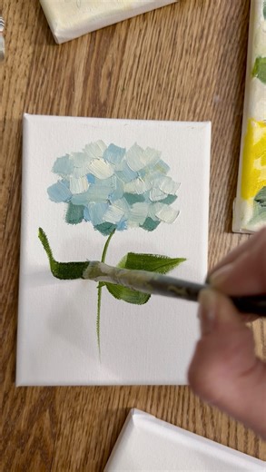 Julia Hetzel on Instagram: "I’ve always credited my maternal grandmother for teaching me to paint—she shaped who I am as an artist. But I recently learned that my paternal grandmother, who was also an artist, painted the same subject I do: flowers in oil. I didn’t grow up knowing her work. I wasn’t trying to follow in her footsteps. But here I am, holding a brush the way she once did, choosing the same medium, and painting the same subject. 🌸 I will be adding some new work (including this hydra