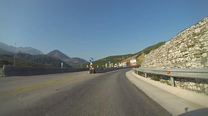 Driving On A Mountain Road With Tunnels In Greece