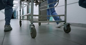 Doctors Feet Running Down Hospital Corridor