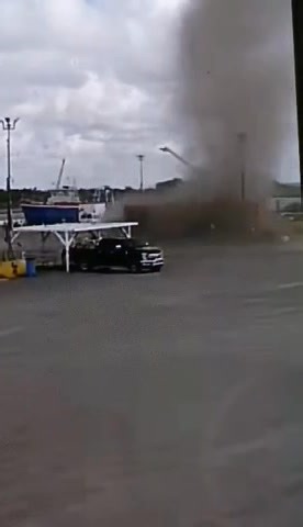 The waterspout that made landfall in Leeville yesterday was located near a shipyard. It tossed around an 18-wheeler among other things. The video shows a man holding onto the Ford truck’s tire as the tornado (waterspout) lifts the carport into the sky. 🎥 Holly Mckeon | WVUE FOX 8