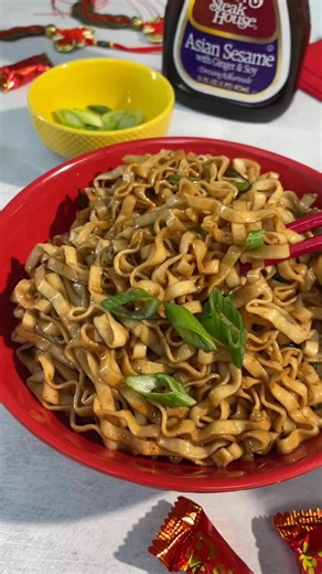 Did you know long noodles symbolize longevity during Lunar New Year? ✨​ This easy Charred Scallion Oil Noodles recipe with Ken’s Asian Sesame dressing is a meaningful (and delicious) way to celebrate. | Ken's Steak House Dressings