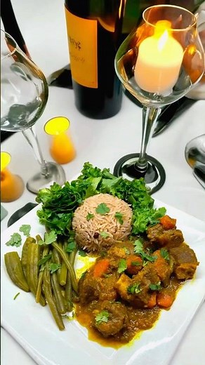 Curry goat 🐐 and rice and peas ￼