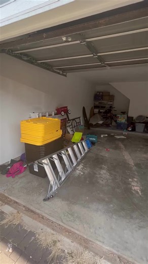 We completed this garage in under just three hours. We added a wall mounted shelf to get some boxes and containers off the floor, and a rail and hook system to hang bicycles and gardening tools. #garageorganization #garagecleanout #garagecleaning #garagecleanup #garagegoals #garage