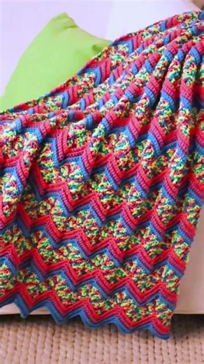 54 reactions | The Glowwave Ripple Afghan is created in shades of the NEW Worsted 8 Neon Lights yarn! This easy crochet afghan features psychedelic ripples for a finished look that stands out!  Herrschners Glowwave Ripple Afghan Crochet Kit: https://www.herrschners.com/herrschners-glowwave-ripple-afghan-crochet-kit/ #afghan #crochet #herrschners | Herrschners Inc. | Facebook