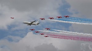 Watch this $1 billion spy plane fly with the Red Arrows