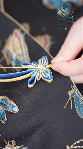 this beautiful handmade floral embellishment!