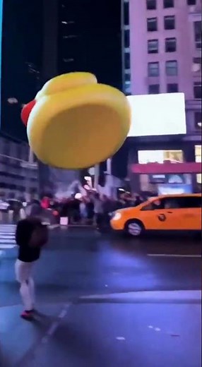 Giant Duck Escapes The Screen In Times Square!