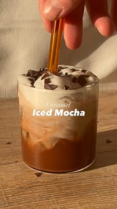 Caramel Iced Mocha 🍫✨ Recipe 👇🏽 . Recipe: - add 15g of cocoa powder - follow @yourcoffeedude for more - add 1 tsp of caramel sauce - pour over one shot of espresso - froth it - add ice - fill up your glass with some sweet cold foam - optionally sprinkle some chocolate chips on top . Sweet Cold Foam: - add 100 ml milk of your choice - 1 tsp of sugar - froth it for 1-2 min . That’s it. Enjoy! 🤎 | Yourcoffeedude