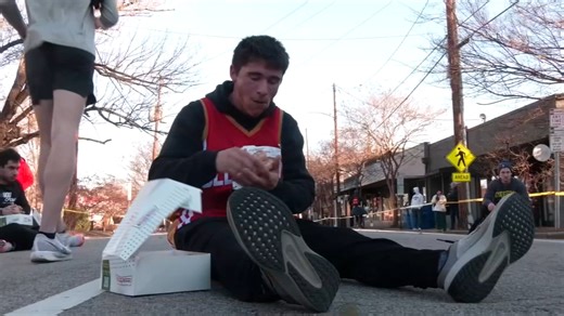 Runners tackle 'Krispy Kreme Challenge' for charity: 5 miles and 12 donuts