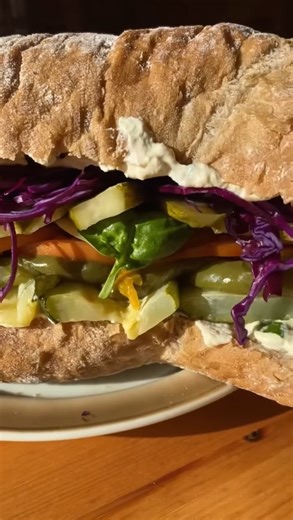 Loaded veggie sandwich with layers of delicious goodness