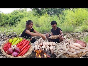 Squid pork spicy grilled on the rock for dinner - Survival cooking in forest