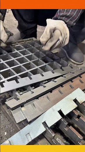 Fabrication or cutting process for components to make steel grating.