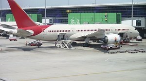 clip-8055373-loading-cargo-plane