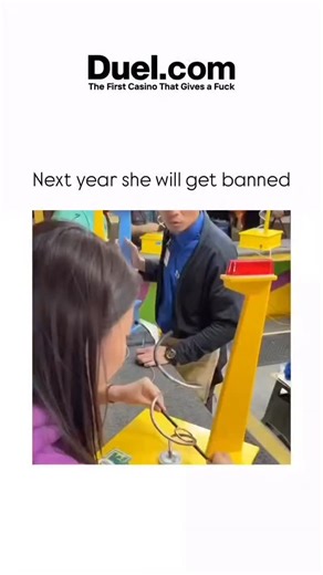 ENTERTAINER on Instagram: "This video is a compilation of several heartwarming moments captured at a carnival or fair, focusing on a woman’s success at various games and the joyful reactions of her and her friends. The video opens with the woman concentrating on a classic carnival game, likely “Operation” or a similar wire loop challenge, where she carefully guides a metal ring along a winding wire. She is successful, leading to an immediate, excited reaction from a friend who throws his hands u