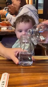 6.5M views · 10K reactions | THE WAY HE STARES AT HIS BOTTLE 來, He is so adorable, Love that little smile when he knows it's almost ready. | The Family Album | Facebook