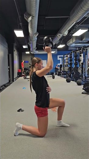 1/2 Kneeling bottoms up KB Press