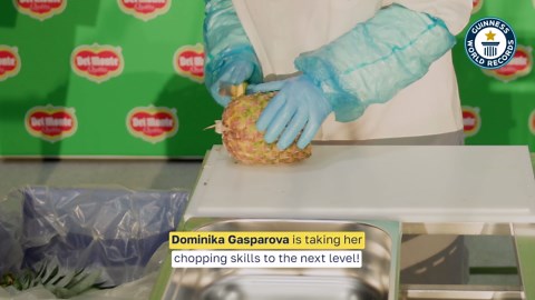 Fastest time to peel and slice a pineapple 11.43 seconds by Dominika Gasparova