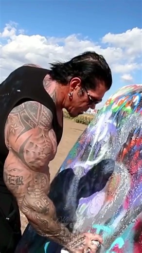 Rich Piana taggin up cars at Cadillac Ranch! Shoutout Texas 5%ERS! #richpiana #5percentnutrition