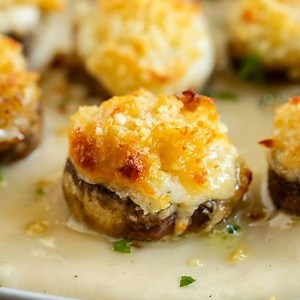 17K views · 84 reactions | White Cheddar Stuffed Mushrooms are an easy make-ahead appetizer idea! They taste just like the Longhorn restaurant with a golden Parmesan crusted topping and flavorful white cheddar sauce. Get the Recipe: https://thecozycook.com/stuffed-mushrooms/ | The Cozy Cook | Facebook