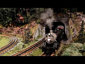 O GAUGE SCALE HIGH RAIL LAYOUT WITH LIONEL AND MTH.