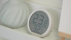 Download Digital temperature and humidity display in a modern interior setting for free