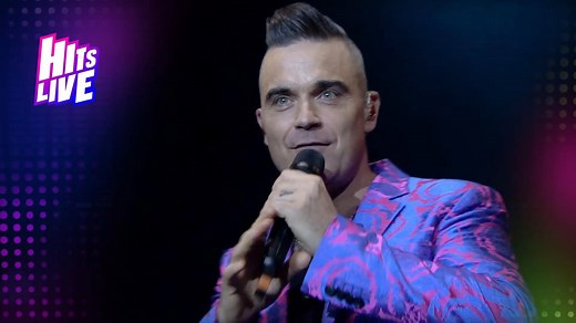 «Feel» es una canción del cantautor británico Robbie Williams, lanzada como el primer sencillo de su quinto álbum de estudio, Escapology (2002). | Videos Musicales Solo En Hd