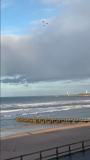 Your Step-by-Step Guide to Visiting Aberdeen, Scotland, rainbow stretching across the sea