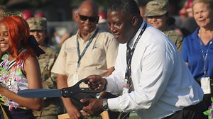Paxon cuts ribbon on new artificial turf high school football field