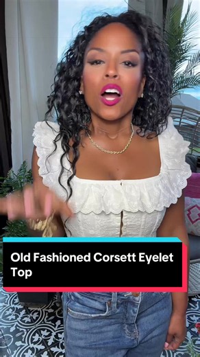 This old-fashioned white eyelet corset is perfect for spring. | corset