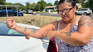 Woman shot by masked robbers, bullet still lodged in her arm