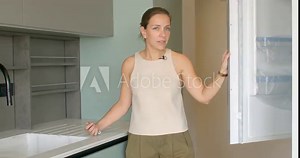 Expert guide imparts insights into principles of kitchen work triangle, fundamental concept for efficient kitchen layouts. Room tour takes us on journey through intricacies of modern interior design. Stock Video