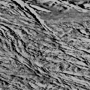 • Zooming In On Enceladus • As it swooped past the south pole of Enceladus on July 14, 2005, Cassini acquired increasingly high resolution views of this puzzling ice world that have been combined into this exciting movie sequence. The movie provides a stunning, up-close look at what is surely one of the youngest surfaces in the Saturn system. • Credit: NASA/JPL/Space Science Institute | Astronomy Nation