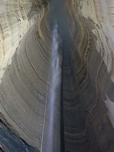 Exploring a Very Deep Pit: An Adventure in Caving