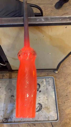 Glass blowing artists work together to create a wine decanter!