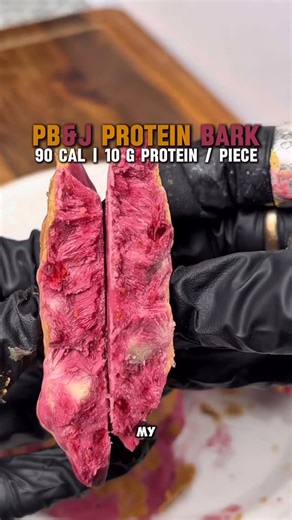 John Clarke on Instagram: "Everytime I make a new flavor it tops the last. These were insane RECIPE & INGREDIENTS (SAVE THIS) PB & J PROTEIN BARK Ingredients • 200 g nonfat Greek yogurt • 30 g vanilla protein powder • 20 g honey • 10 g real peanut butter • 2 tbsp PB powder • 200 g frozen raspberries • 15 g honey How to make Microwave raspberries until soft, mash, and stir in honey to make a quick jam. In a bowl, mix yogurt, protein, honey, powdered PB and real PB until smooth. You can mix the ja