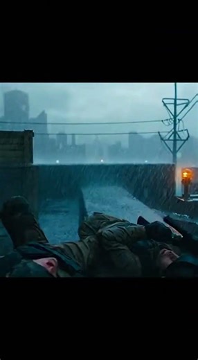 Sniper rooftop scene during heavy rain