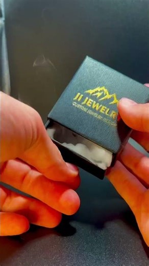 Custom meteorite opal ring set in a black Damascus ￼￼